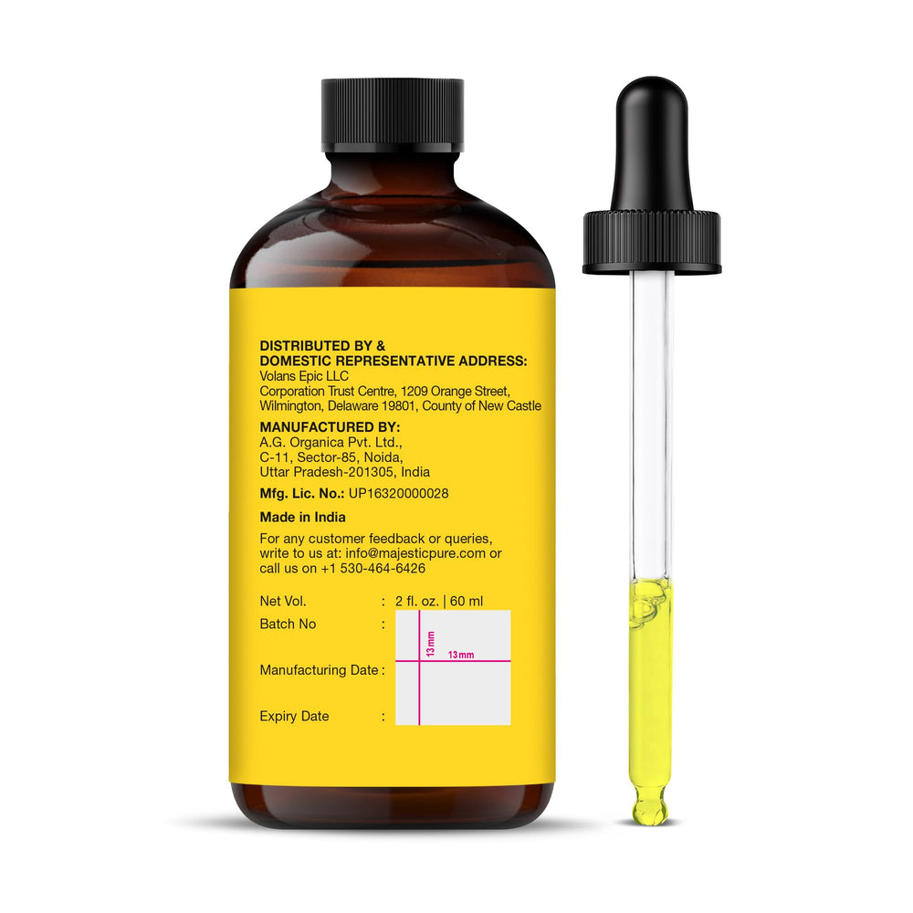Amber glass bottle of Majestic Pure Vitamin E Oil in natural light.