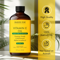 Applying Majestic Pure Vitamin E Oil to facial skin for moisture.