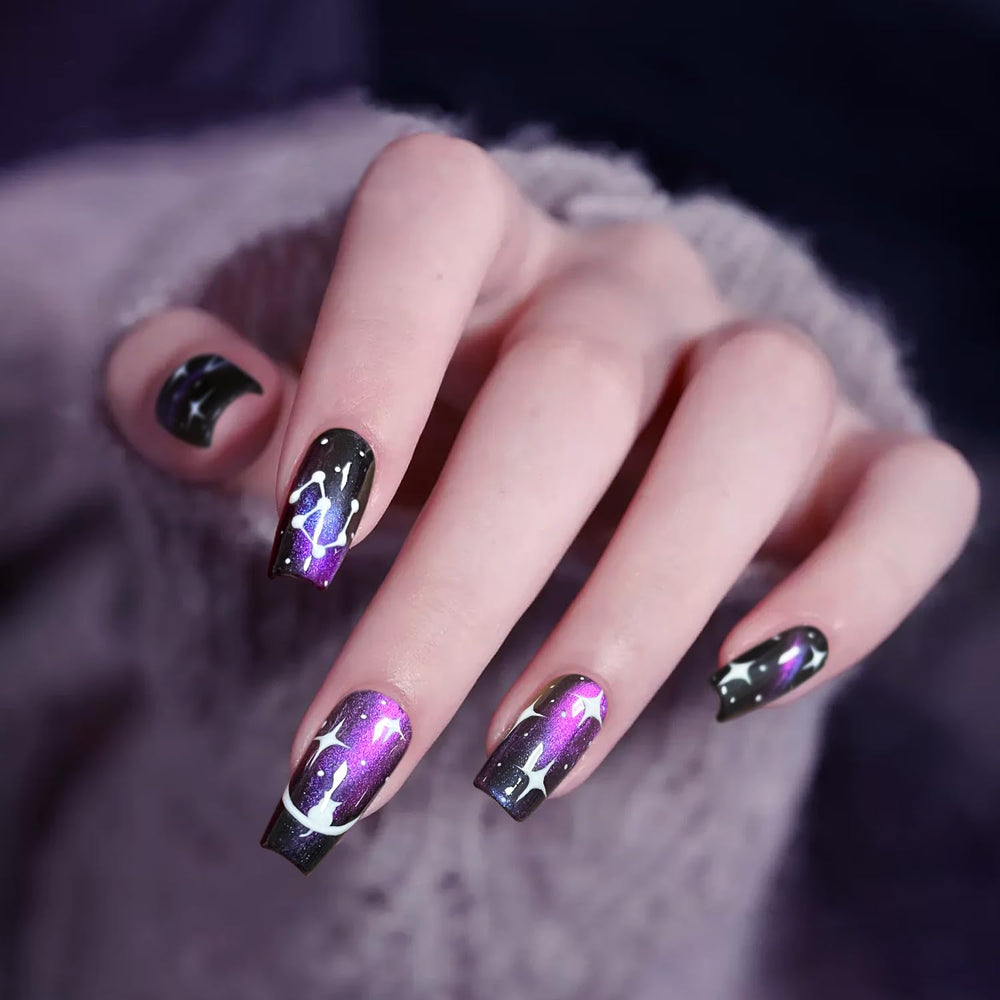 Major Dijit Cat Eye Nail Polish on black base highlights dramatic color shift.