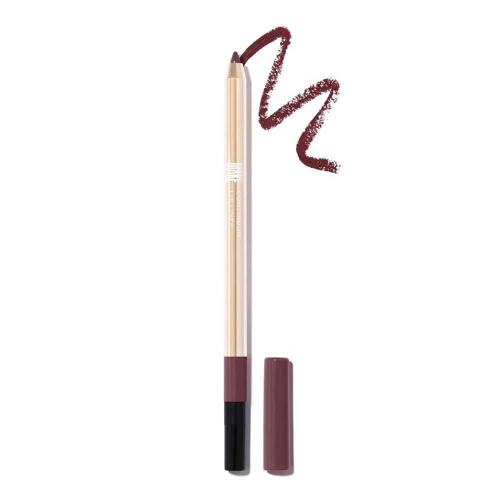 MAKE Beauty Momentum burgundy-brown lip liner swatch on skin for defined lips.