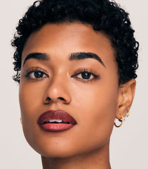 Momentum velvet-matte finish delivering luxurious lip definition and color depth.