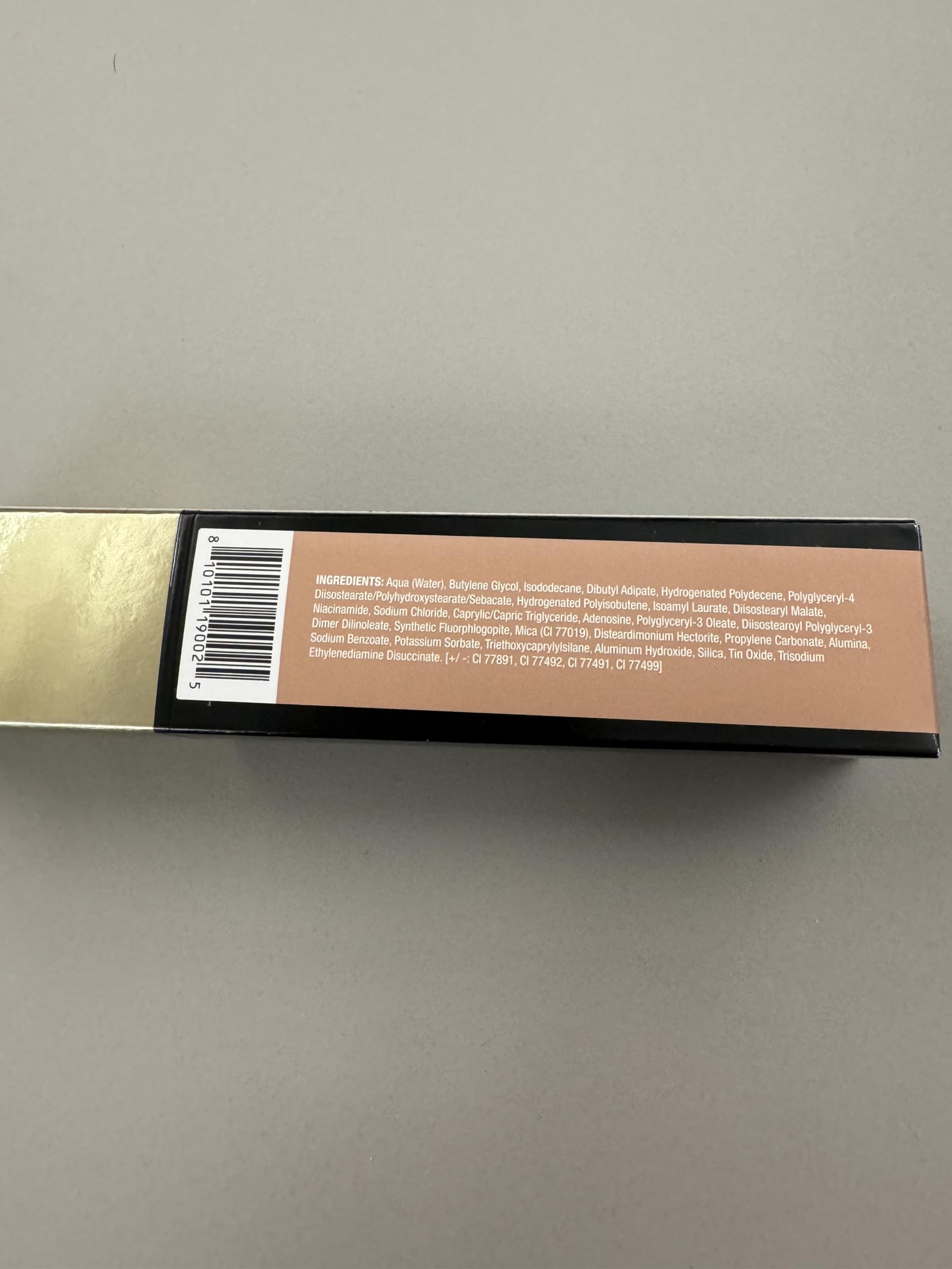Clean packaging design of MAKE Diffusion Dew Skin Tint for a sleek look