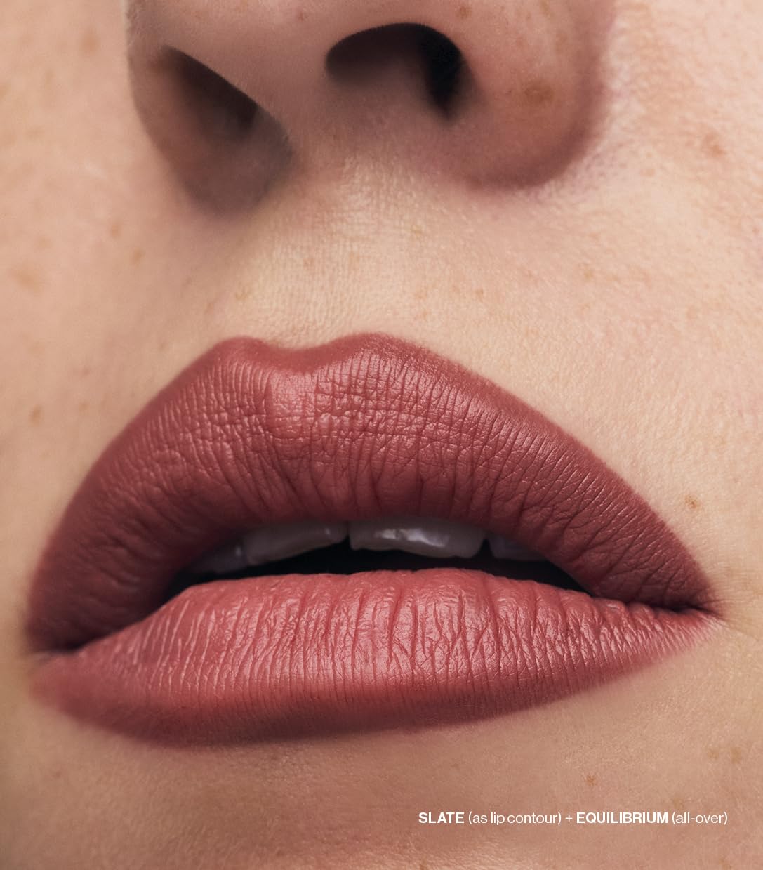 Blending brush beside MAKE Lip Continuum slate for seamless blending