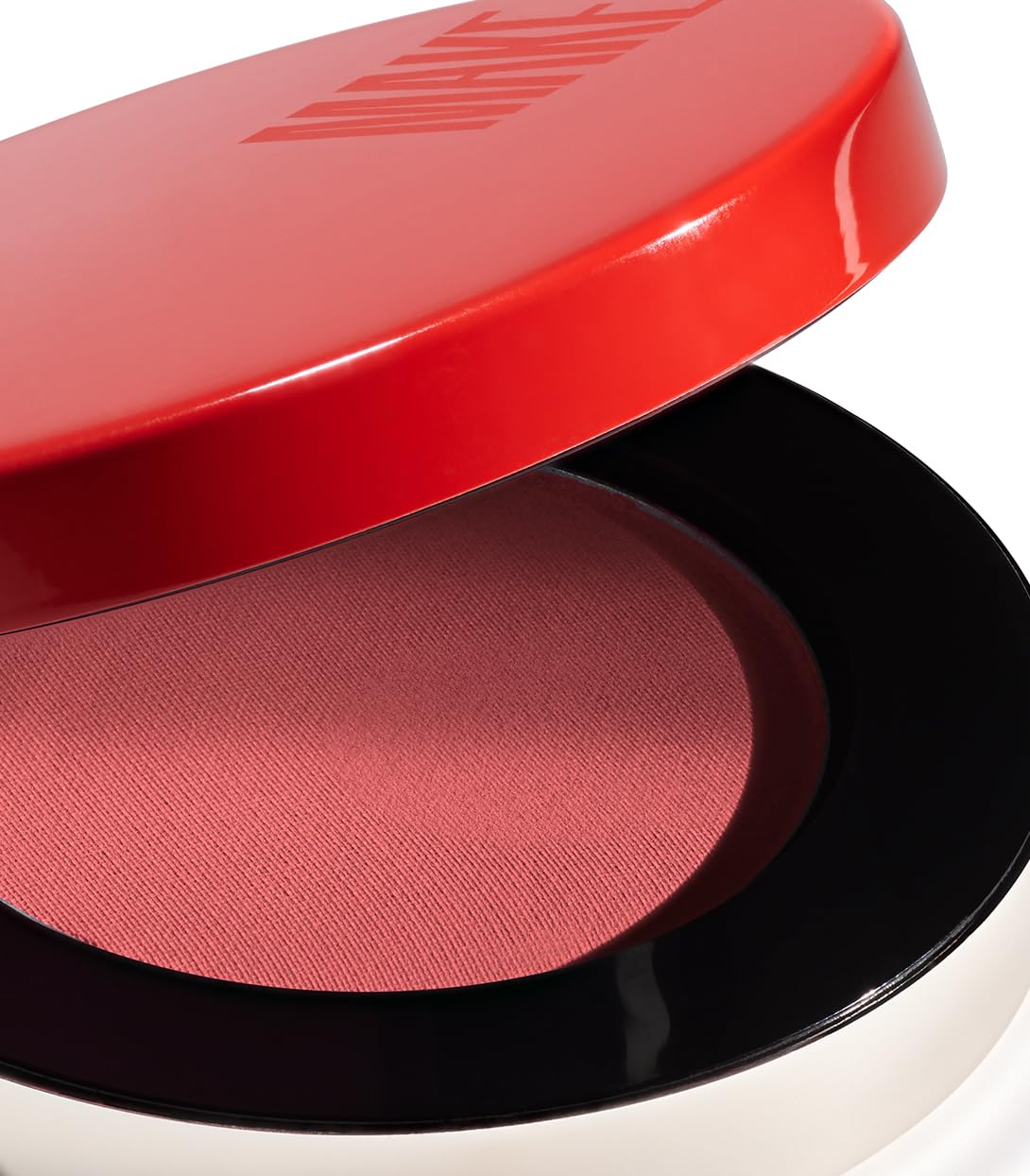 MAKE Beauty microsuede texture enables smooth application on cheek.