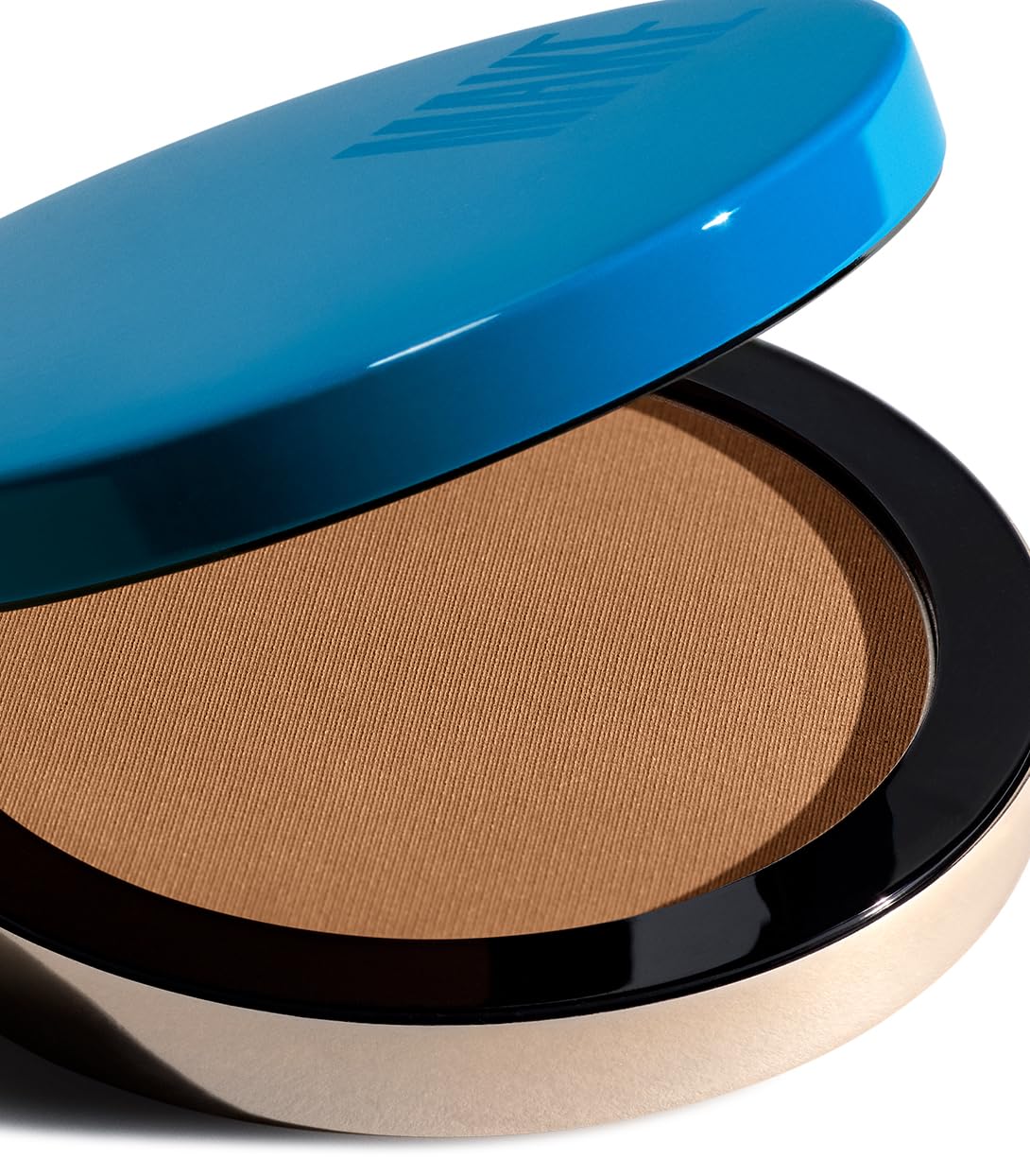 MAKE Beauty Microsuede texture bronzer application blends seamlessly for a natural sun-kissed look