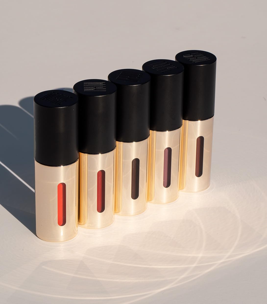 Packaging shot of MAKE Beauty Serum Balm Intense with premium branding.