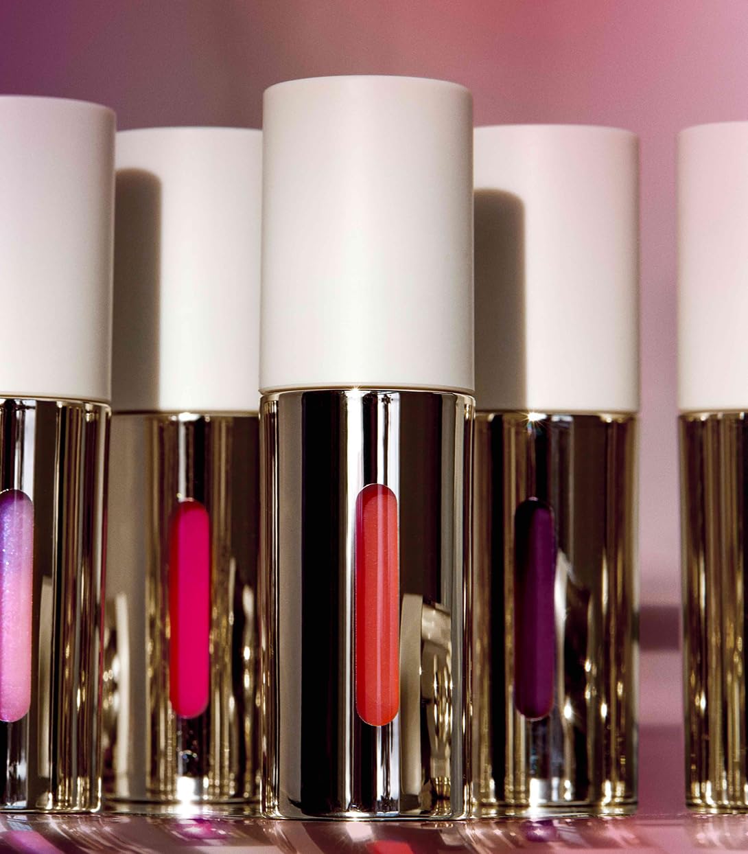 MAKE Halo Moon lip oil outdoors showcasing moisture and shine.