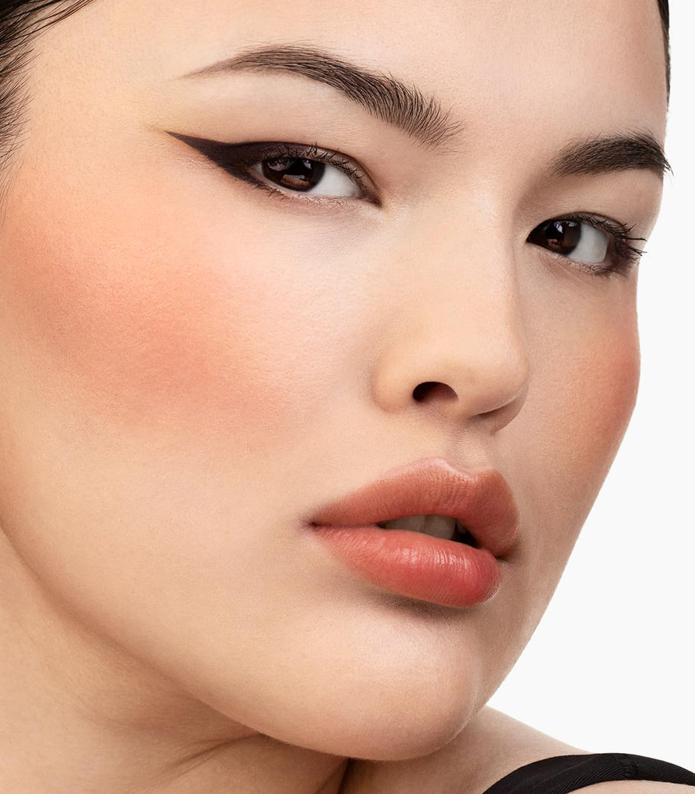 MAKE Beauty Skin Mimetic Blush swatch in Vivid Dream orange for vibrant color