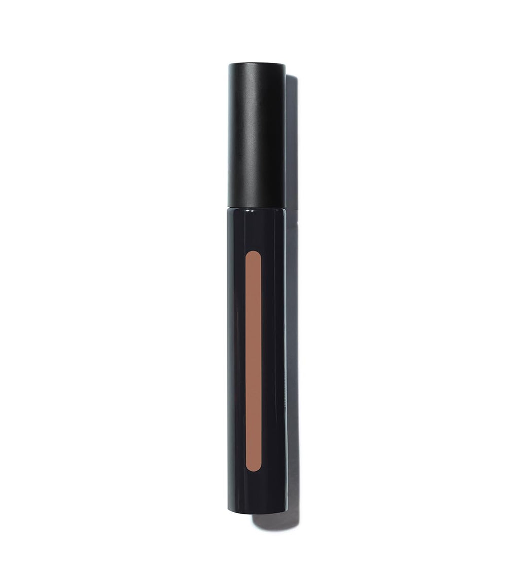 MAKE Beauty Skin Mimetic Concealer deep-warm shade for rich complexions.