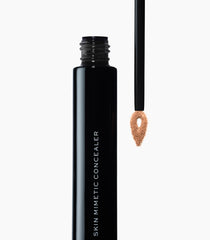 MAKE Beauty Skin Mimetic Concealer swatch under-eye area shows natural, blendable coverage.