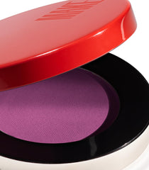 MAKE Galactic purple swatch on skin shows vibrant matte finish.