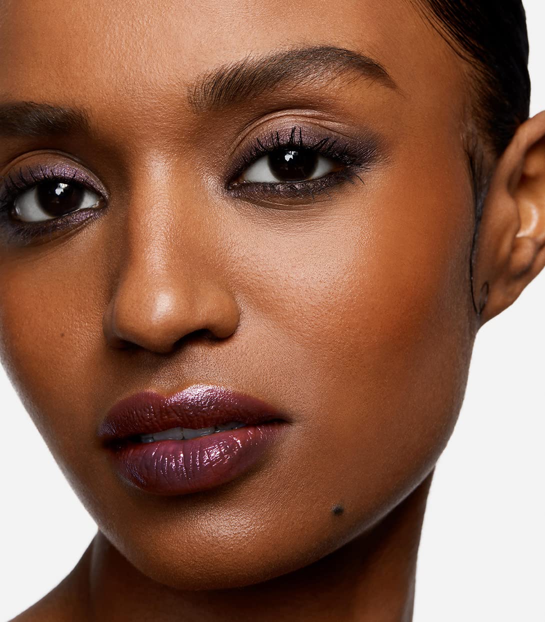 Purple Paradigm swatch reveals wine purple pigment and lasting hydration.