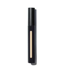 Brush stroke with MAKE Skin Mimetic Concealer showing buildable coverage.