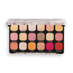 Makeup Revolution Regal Romance swatches show warm mattes and peach-pink shimmers.