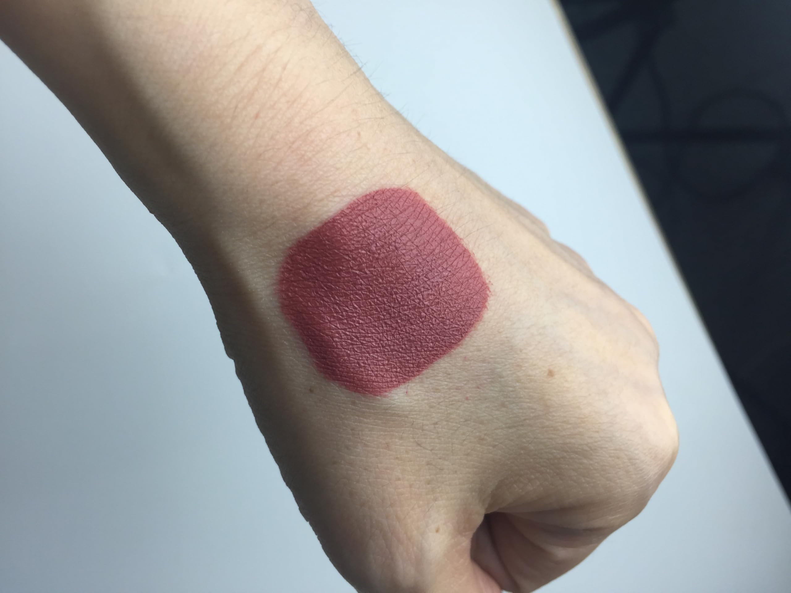 Model wearing MAKI YIKA Brown Nude Lipstick for a party-ready look