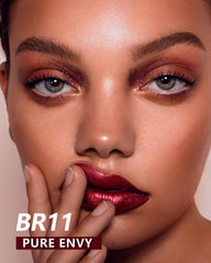 MAKI YIKA lipstick application swatch shows rich metallic color on skin.