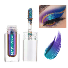 MAKI YIKA teal liquid eyeshadow bottle shows holographic shimmer for bold looks.