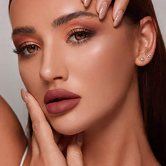 MAKI YIKA long-wearing matte lipstick close-up showing smooth finish.