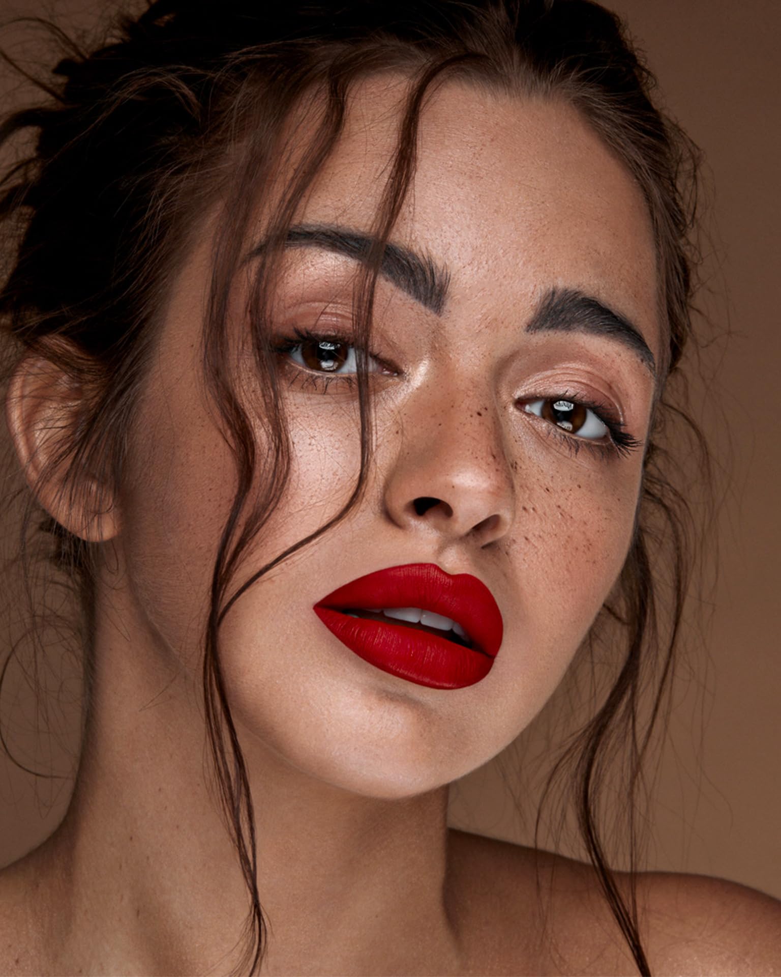 MAKI YIKA red lipstick on lips with rich matte finish