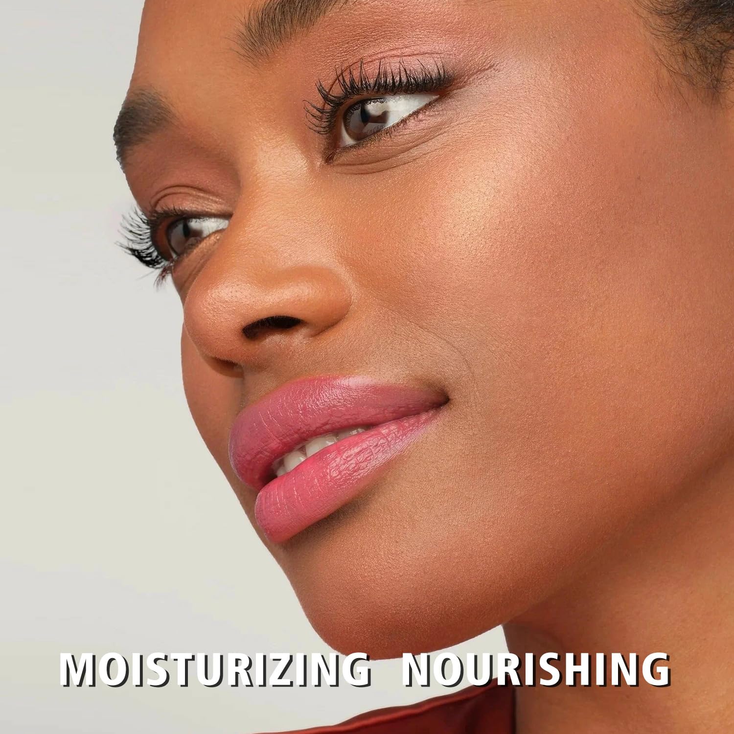 MAKI YIKA lip swatch shows nude pink shade with hydrating shine.