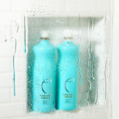 Malibu C Hard Water Conditioner bottle highlighting detangling hydration and mineral defense.
