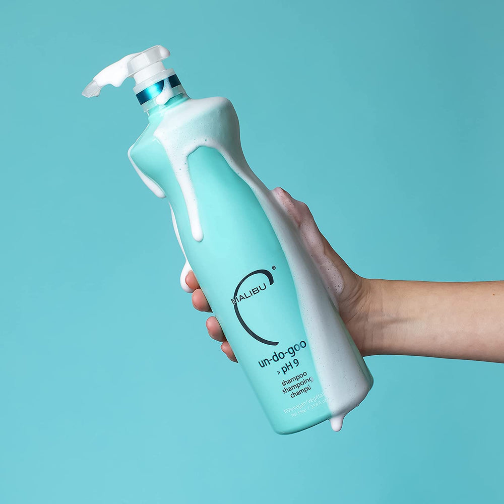 Malibu C Un-Do-Goo bottles on a vanity suggest pre-color service detox