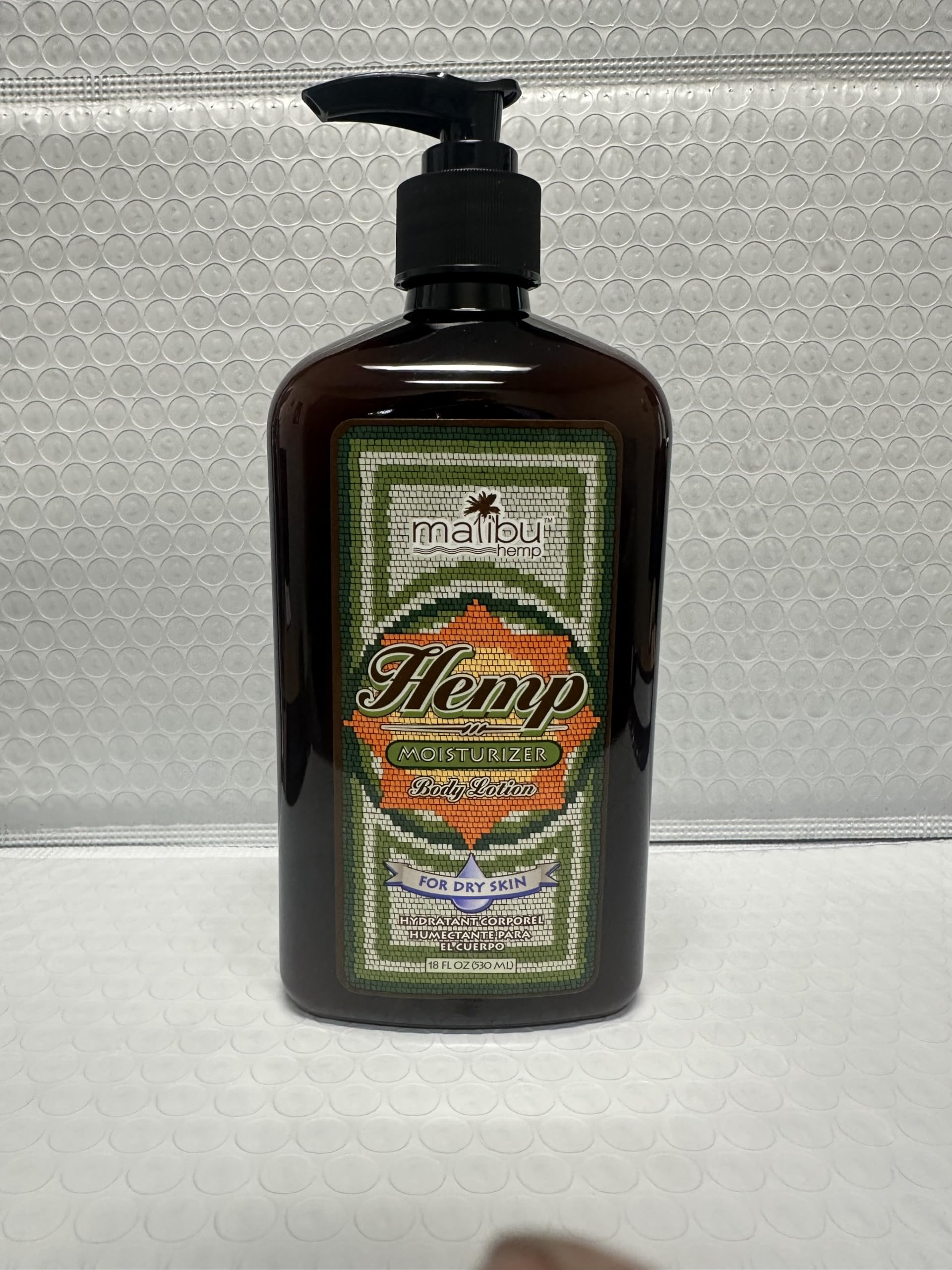 Shelf display of Malibu Tan packaging conveys value and presence.