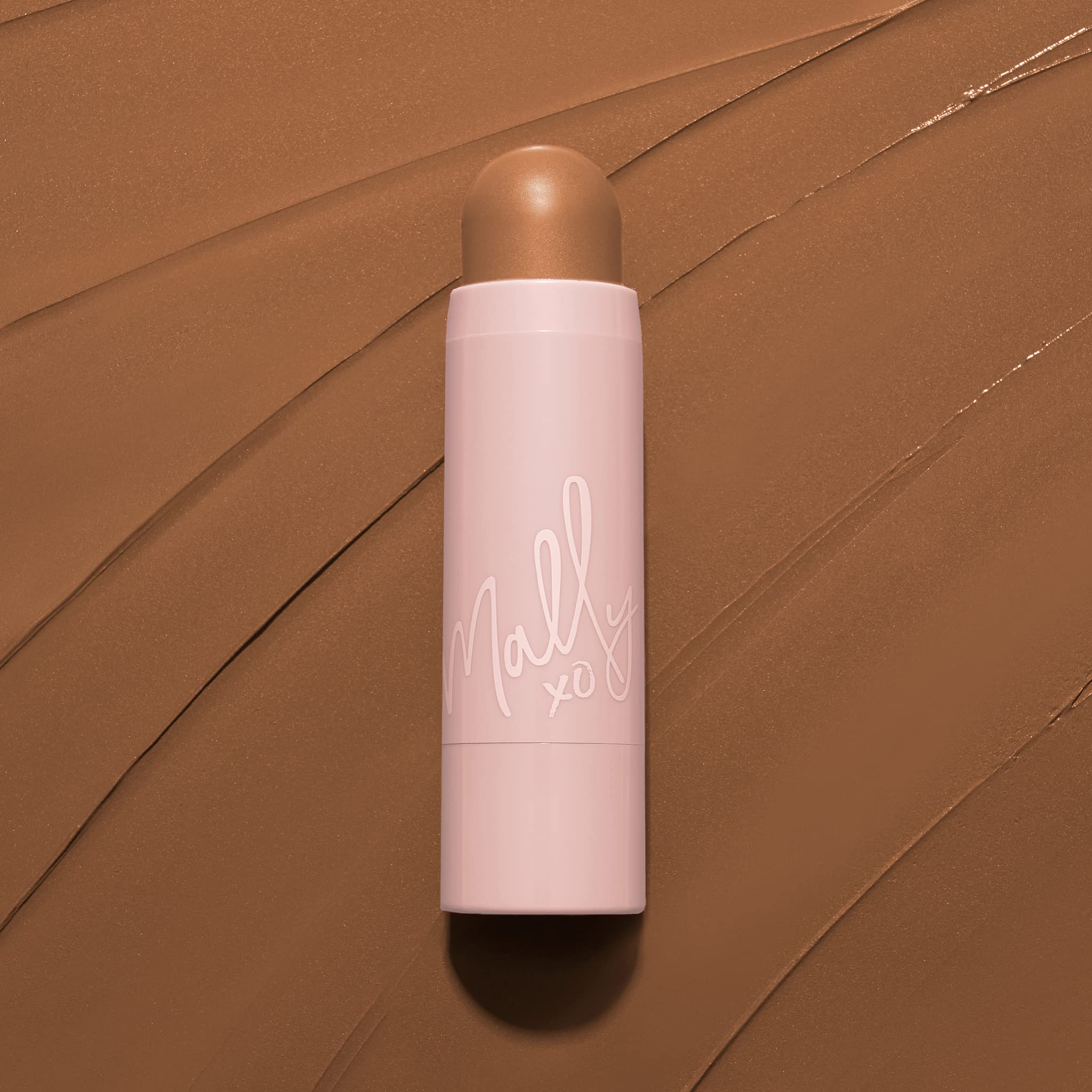 Mally Beauty Shimmer, Shape & Glow highlights temples and lips for cohesive radiance.