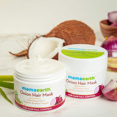 Mamaearth Onion Oil Hair Mask creamy texture spread on hair for easy application.
