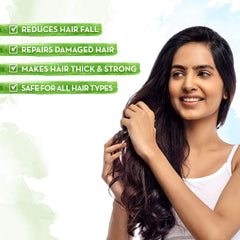 Mamaearth Onion Oil Hair Mask applying a rich layer for smoother, softer strands.