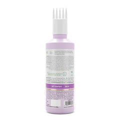 Drop of Mamaearth Rosemary Hair Oil releasing onto scalp for easy application.