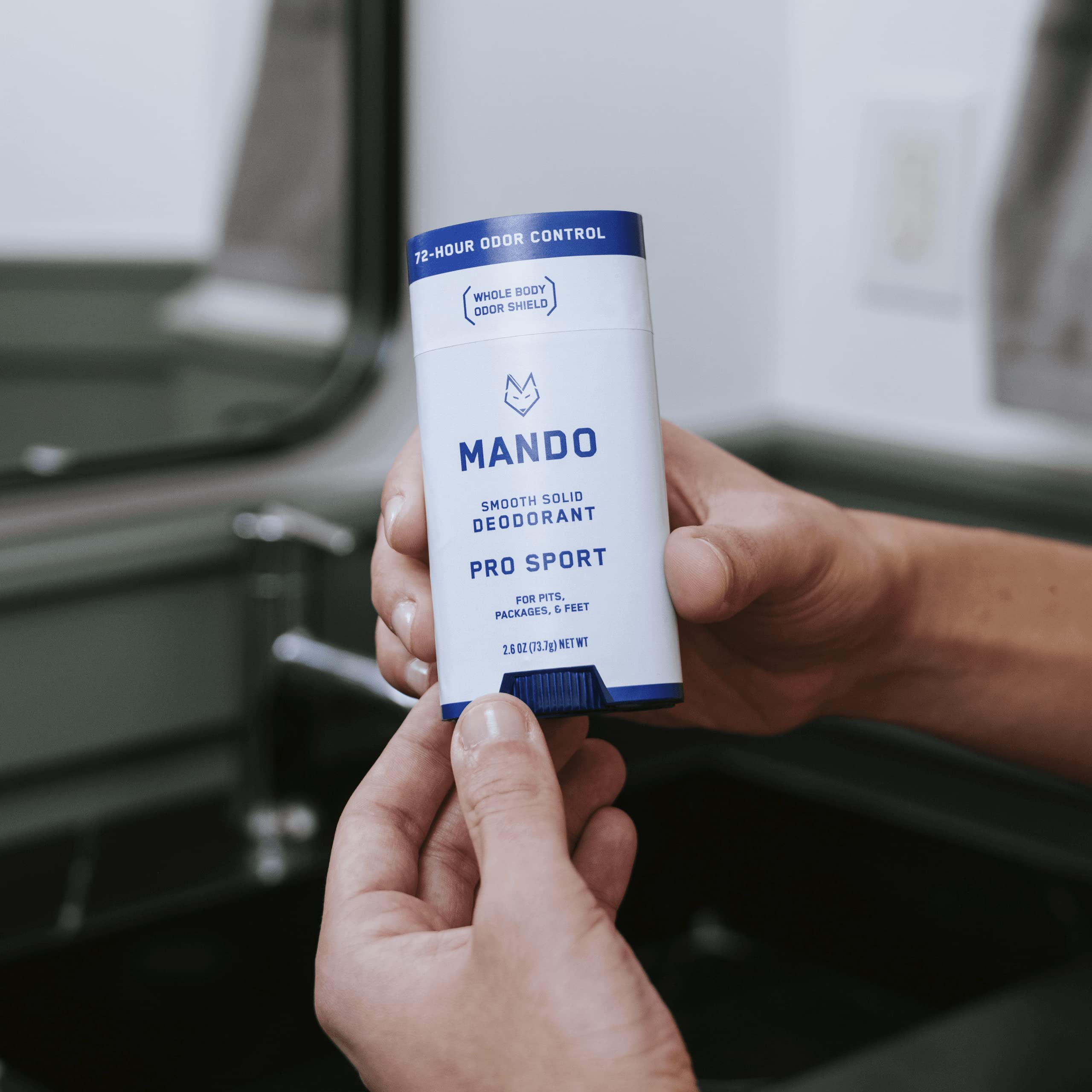 Mando Body Wash pump bottle shows easy one-handed dispensing.