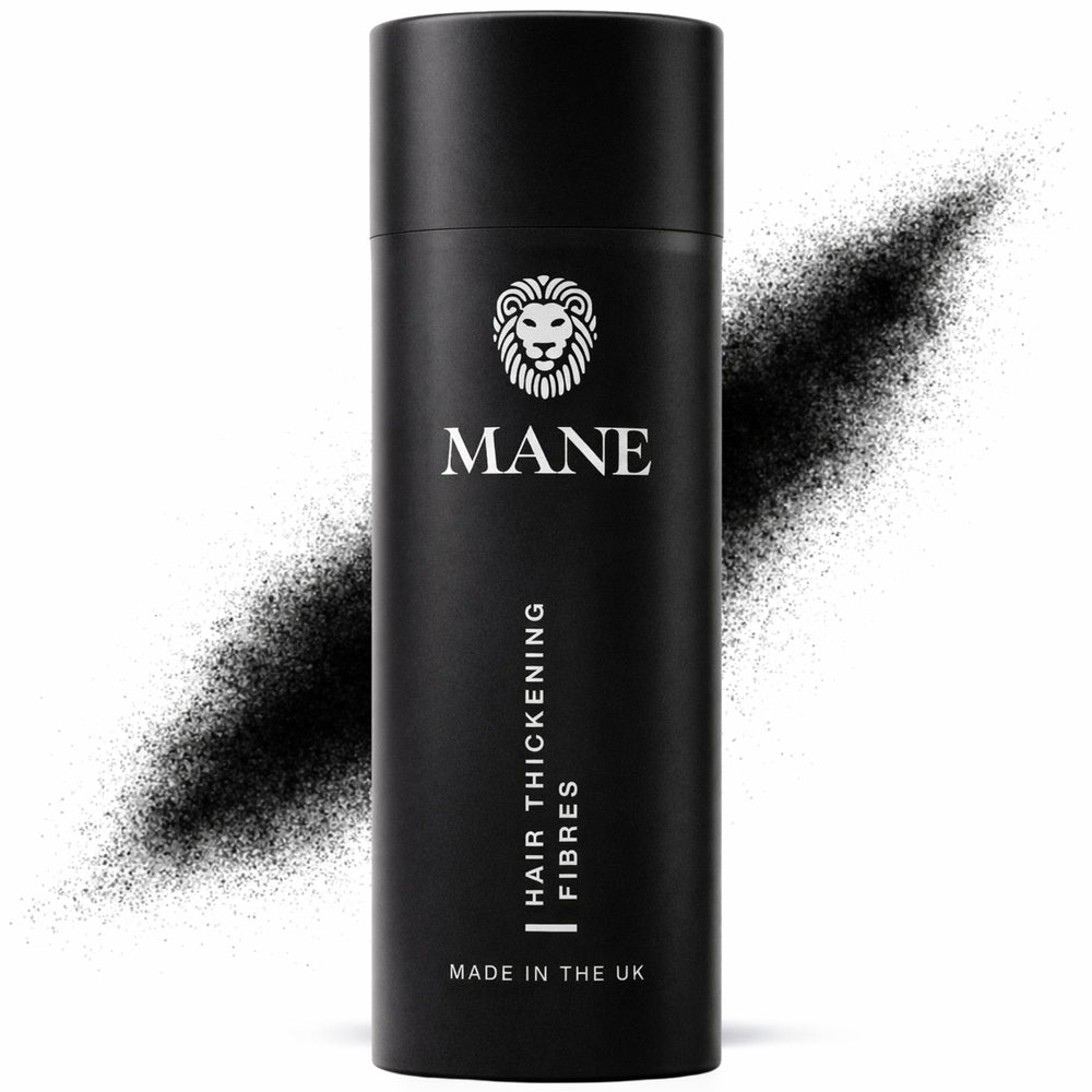MANE Hair Building Fibers Jet Black blend naturally at the crown.