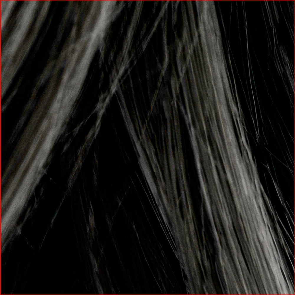 MANE Hair Thickening Fiber Spray atomizer for precise, mess-free application.
