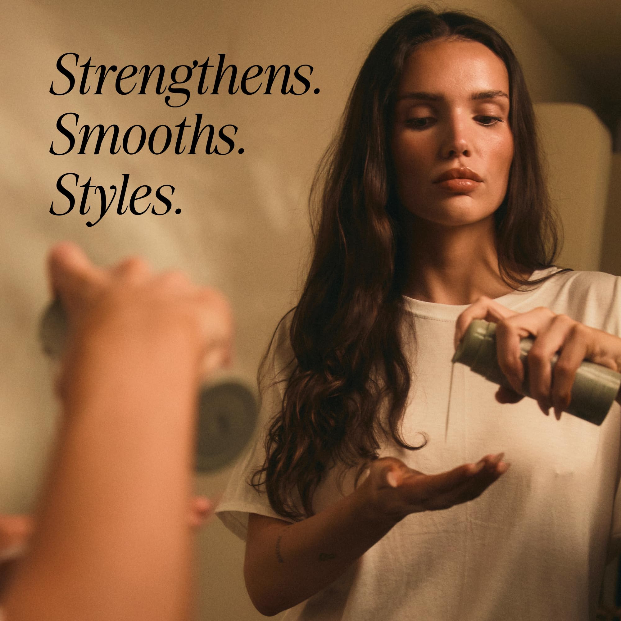 MANE IVY Hair Elixir Serum pump in action delivering 24-hour sleekness