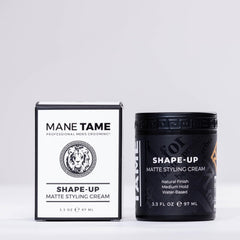 Mane Tame Shape-Up Matte Cream being applied by hand for smooth distribution.