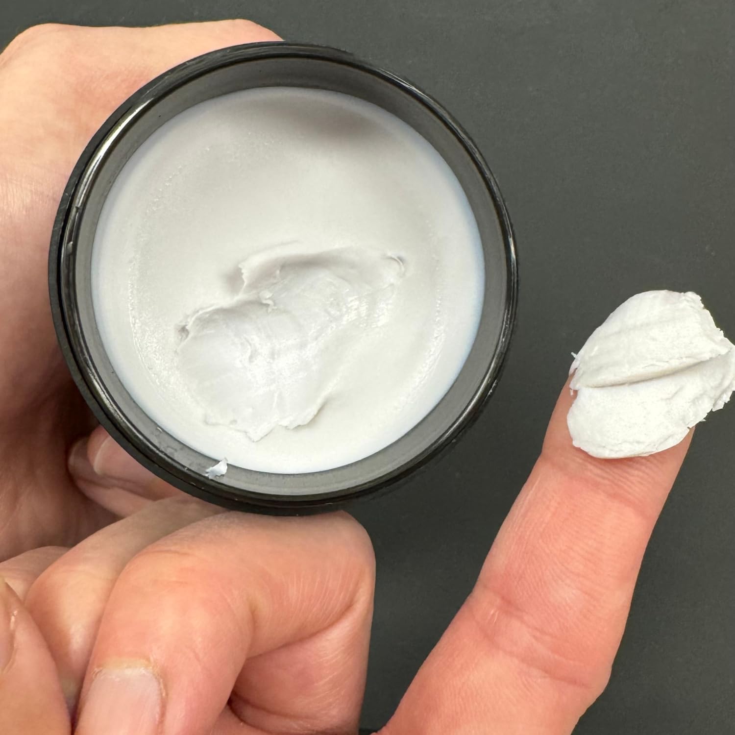 Mane Tame Shape-Up Matte Styling Cream on hair for versatile styling.