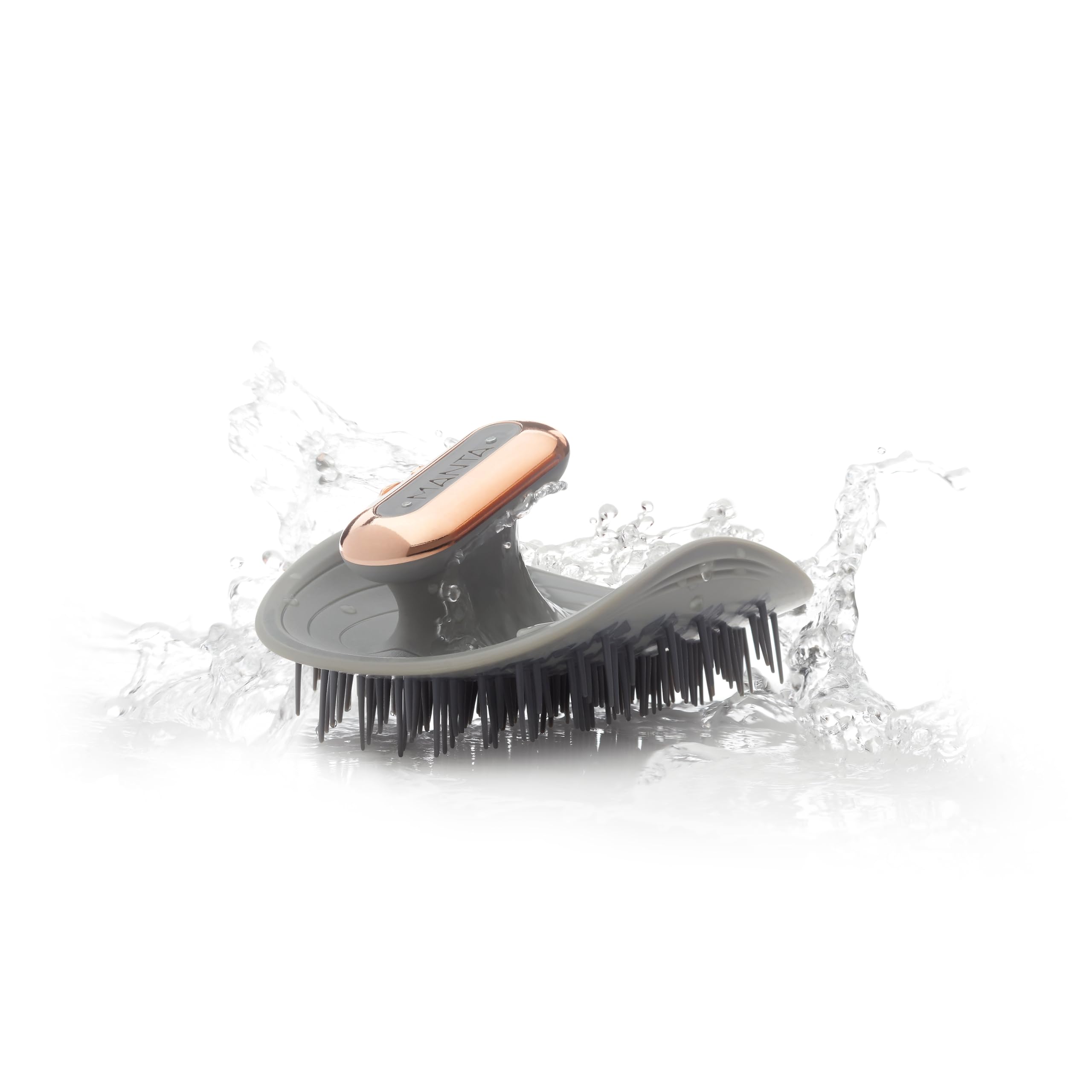 MANTA Pulse electric scalp massage brush showing palm-molded design for comfortable grip.