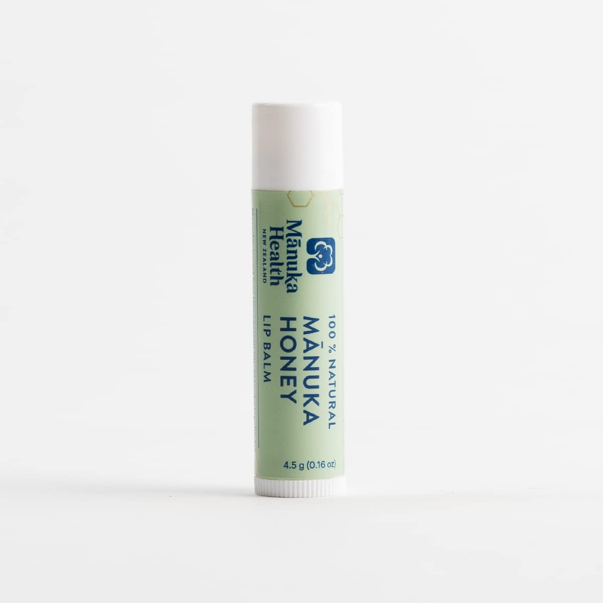 Manuka Health Lip Rescue natural ingredients display on label.