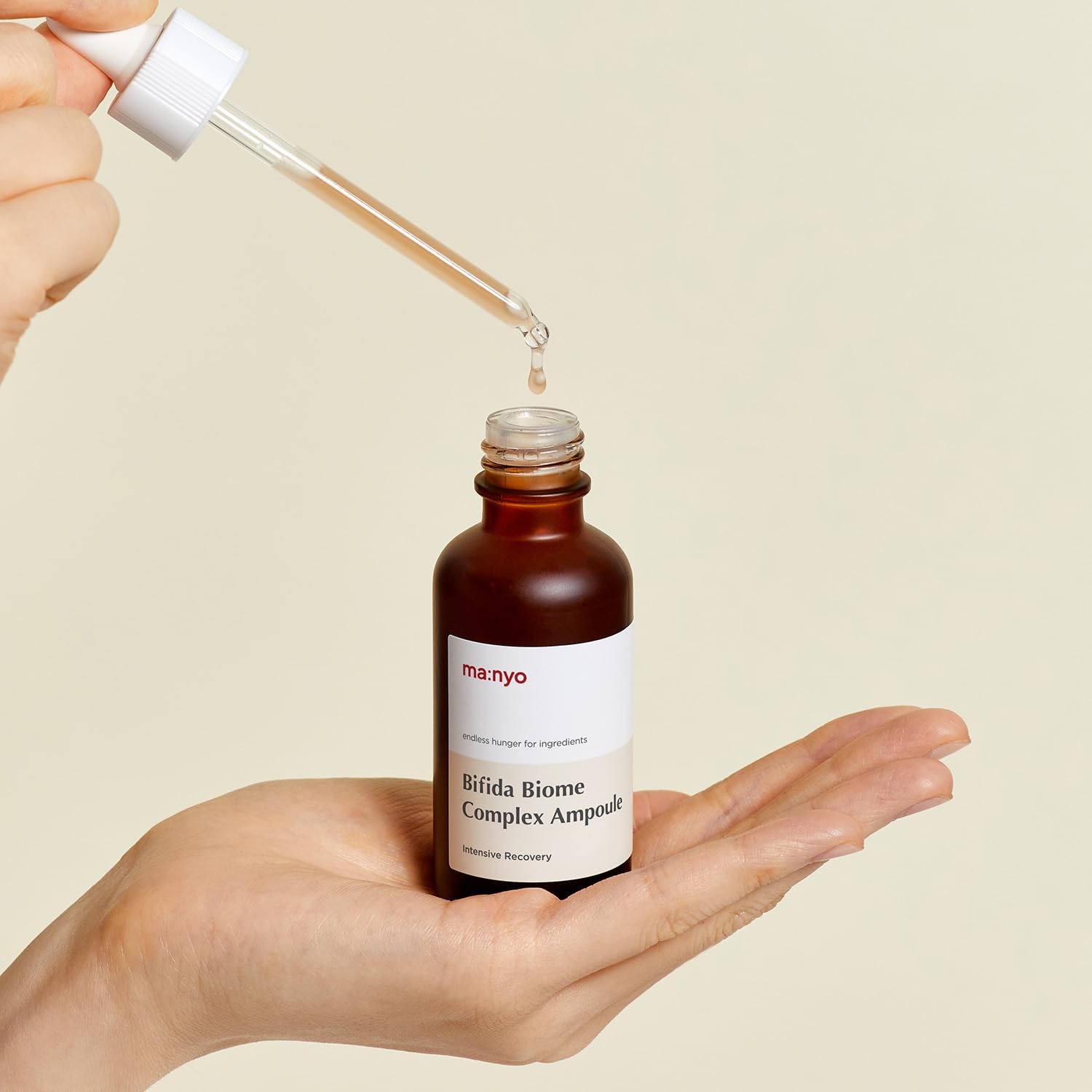 MANYO serum texture close-up demonstrates lightweight, non-sticky finish.