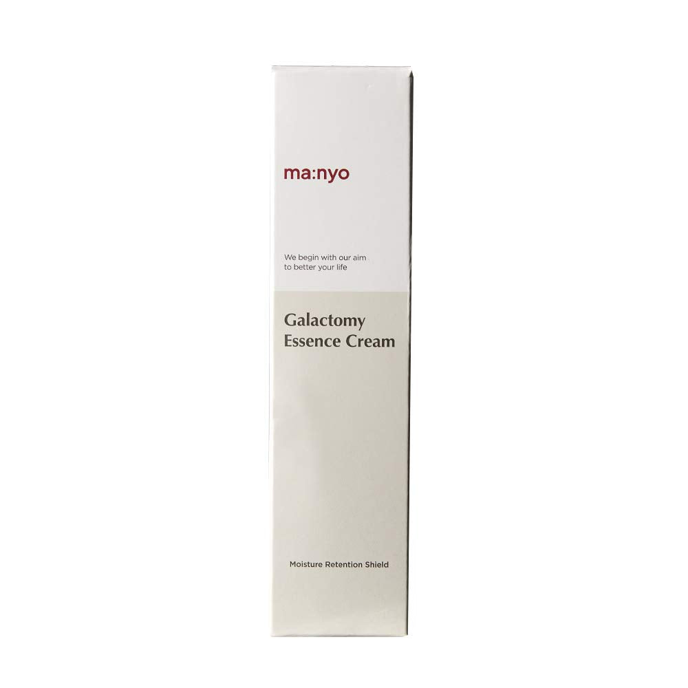 Manyo Galactomy Essence Cream packaging on a softly lit dresser.