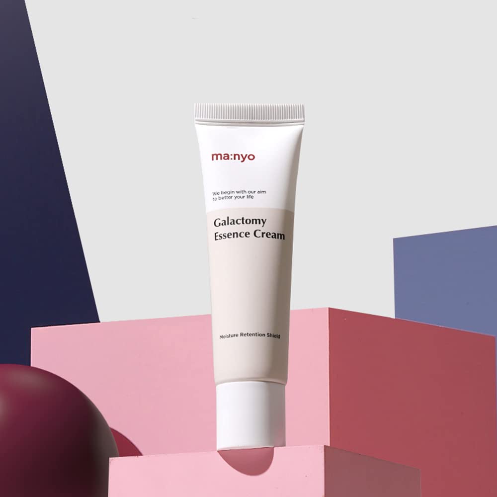 Manyo Galactomy Essence Cream tub close-up on vanity packaging.