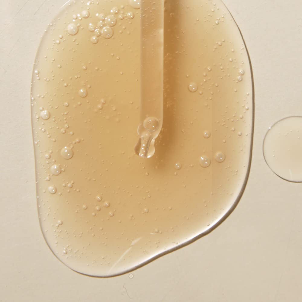 Dropper disperses clear serum for quick absorption in MANYO formula.