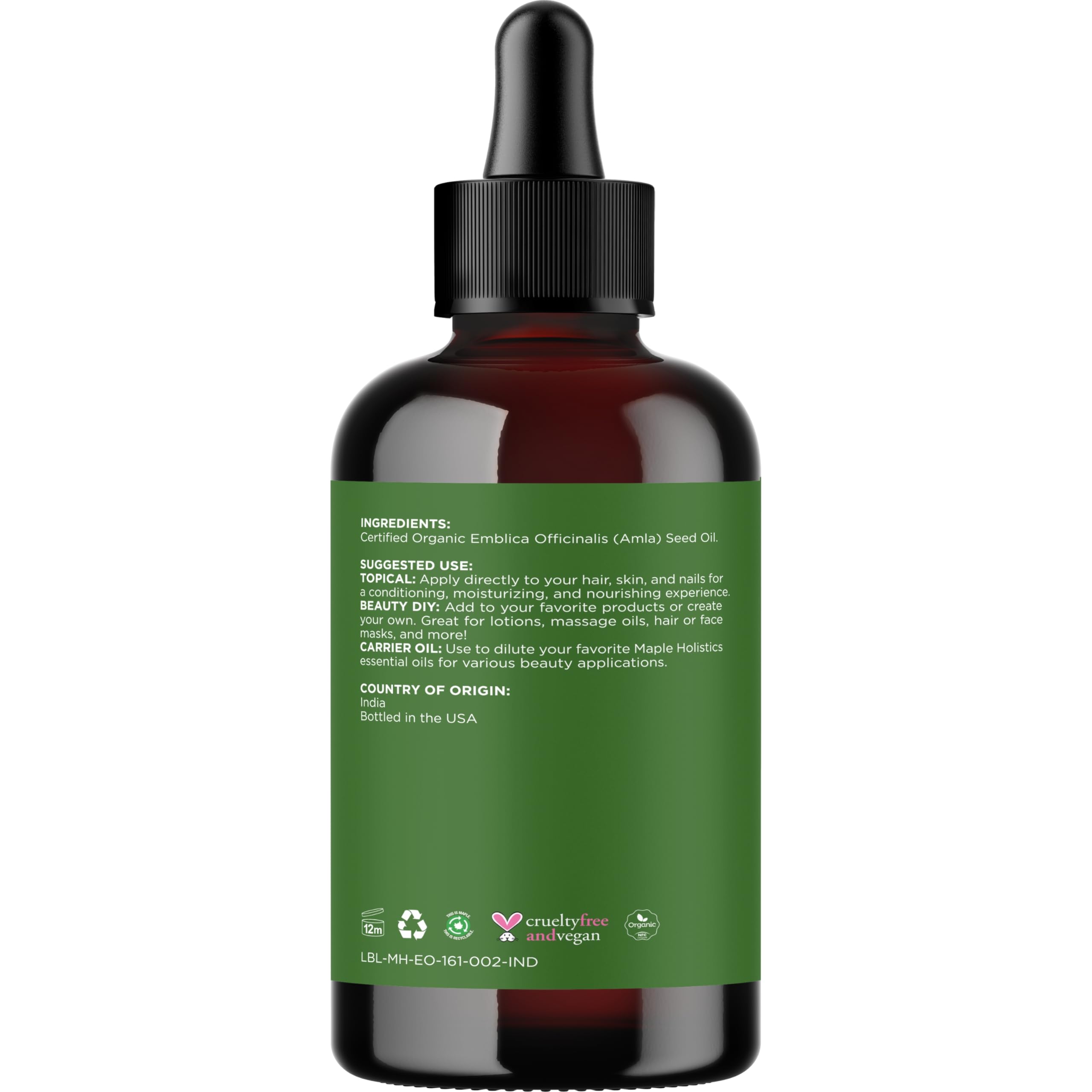 Maple Holistics Amla Oil ingredients closeup emphasizes natural nutrition.