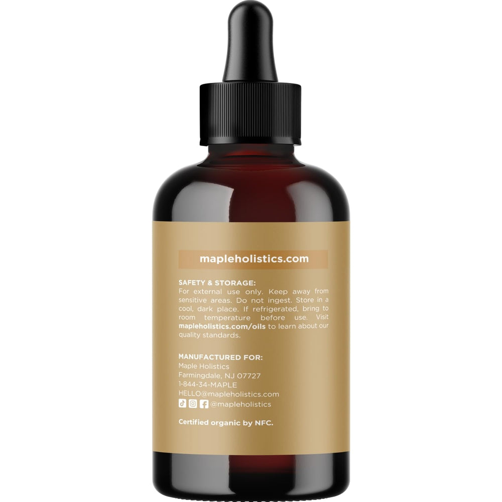 Maple Holistics Organic Jojoba Oil as face moisturizer; nourishes skin.