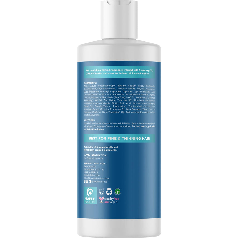Coconut oil bottle emphasizes hydration in Maple Holistics Rosemary Biotin Shampoo