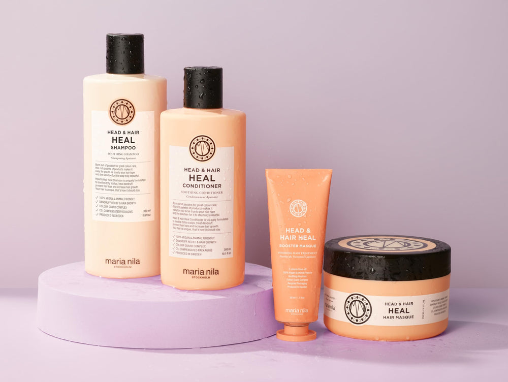 Maria Nila Head & Hair Heal conditioner texture close-up for hydrating feel.
