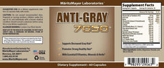 Anti Gray Hair 7050 capsules closeup emphasizes essential nutrients for follicles