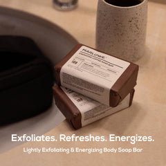 MARLOWE coffee-bean exfoliation image highlighting scrub action.
