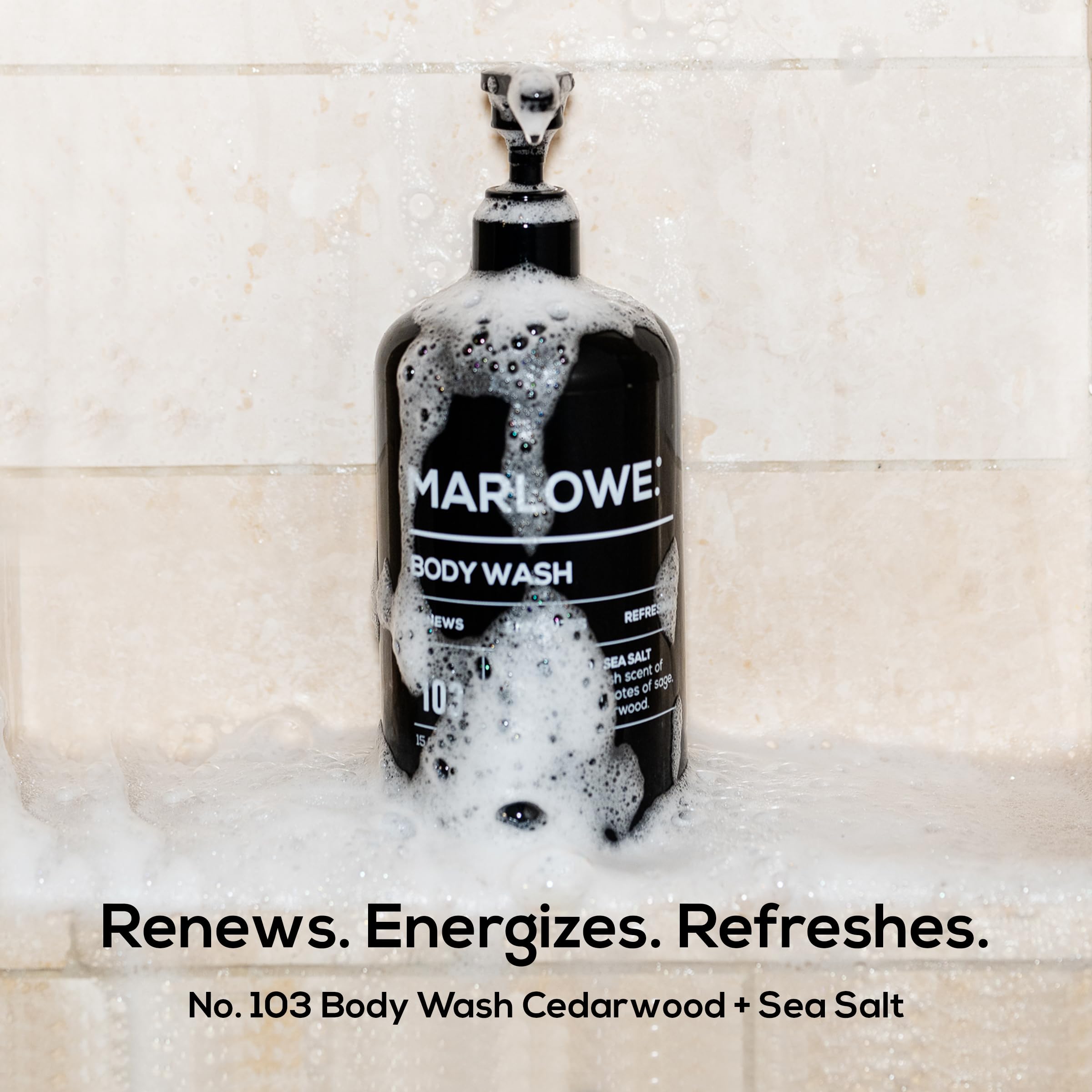 Close-up of MARLOWE No. 103 label highlighting cedarwood scent notes